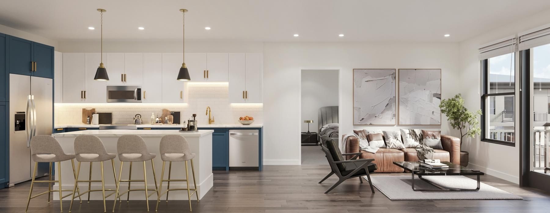 a kitchen with a couch and chairs